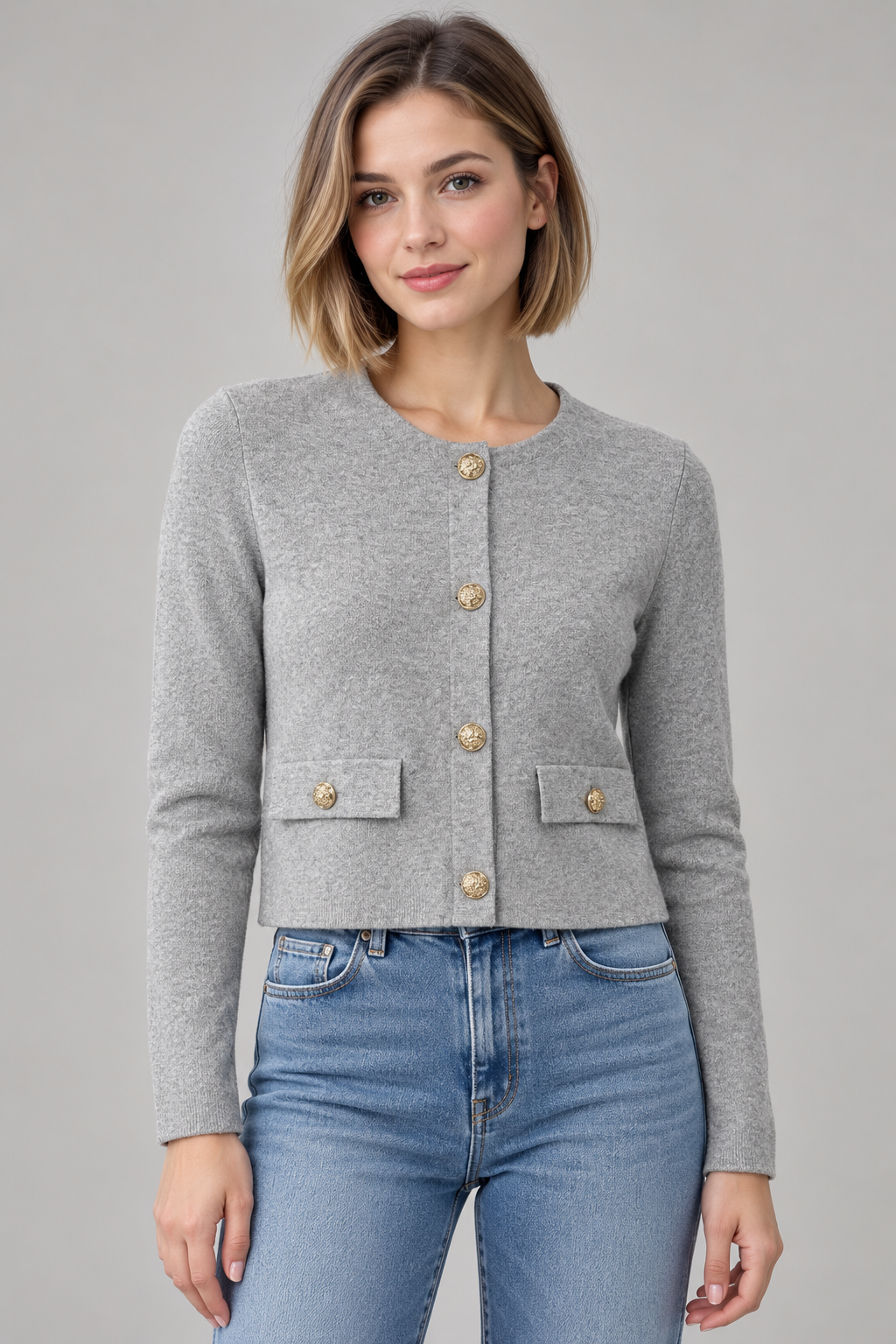 Cardigan grigio con bottoni dorati