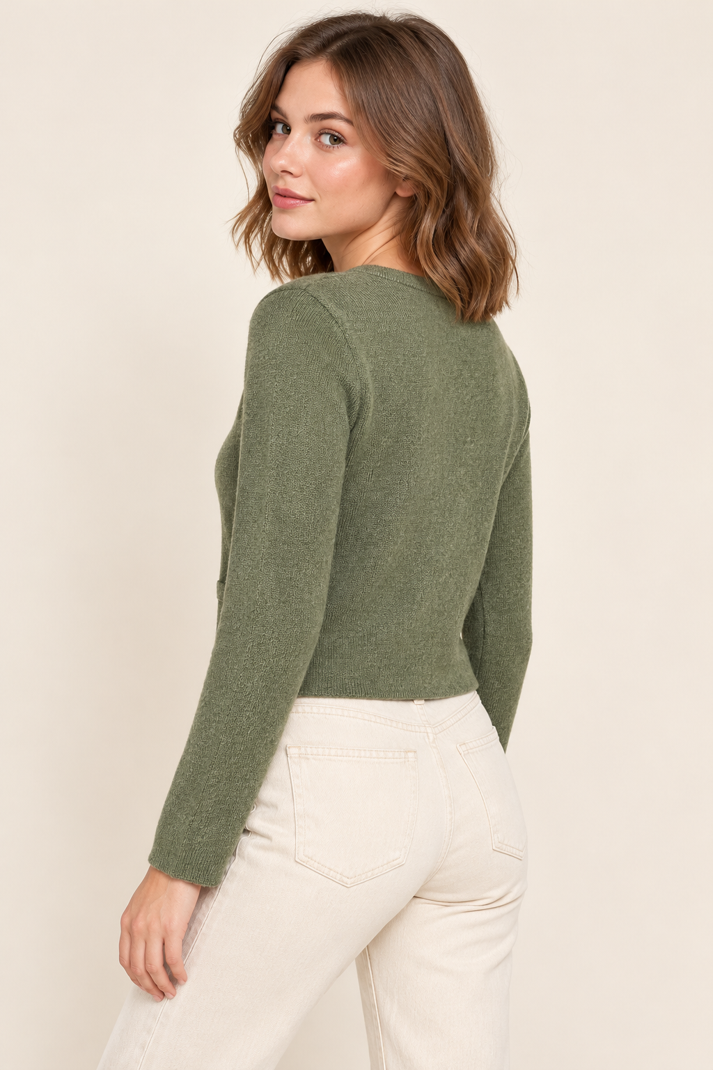 Cardigan verde con bottoni dorati